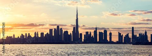 Obraz na plátne Skyscrapers skyline of Dubai UAE downtown with Burj Khalifa at sunset