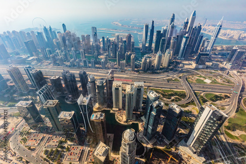 City downtown aerial view of Dubai skyscrapers at sunset