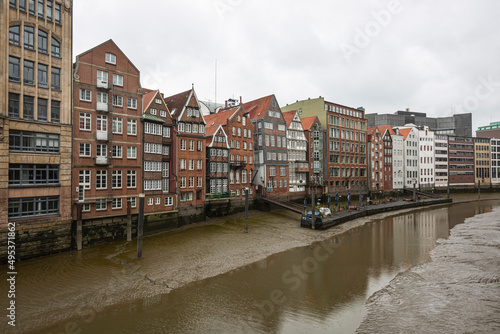 Germany, Hamburg, Row of townhouses along Nikolaifleet canal photo