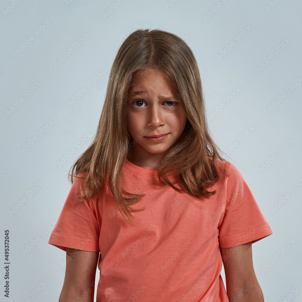 Partial image of little girl with skeptical face Partial image of little girl with skeptical face