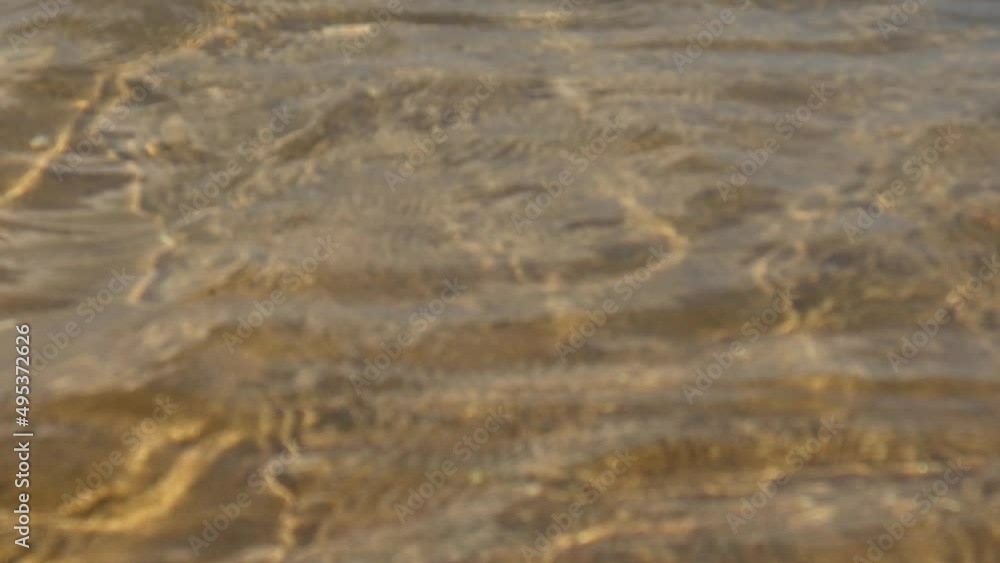Detailed close up view on water surfaces with reflecting sunlight on the waves and ripples. High quality video Detailed close up view on water surfaces with reflecting sunlight on the waves and ripples. High quality video
