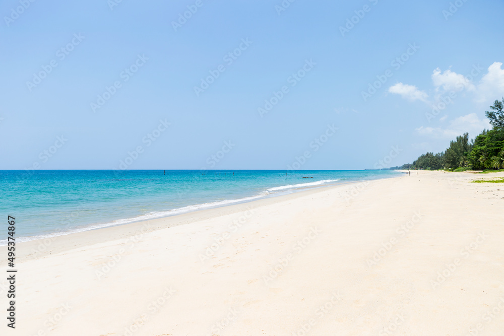 Empty clean white sandy beach in sunny day, tropical island in south of Thailand, holiday destination to the beach in Asia