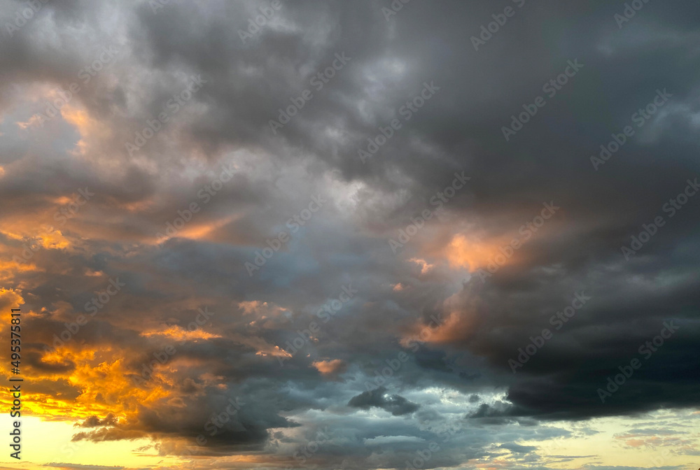 Beautiful sunset sky with a low clouds