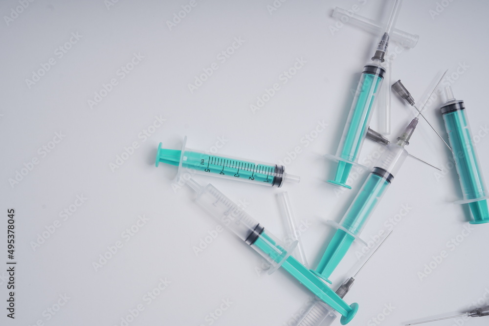 medical disposable injection syringe on a white background medical disposable injection syringe on a white background