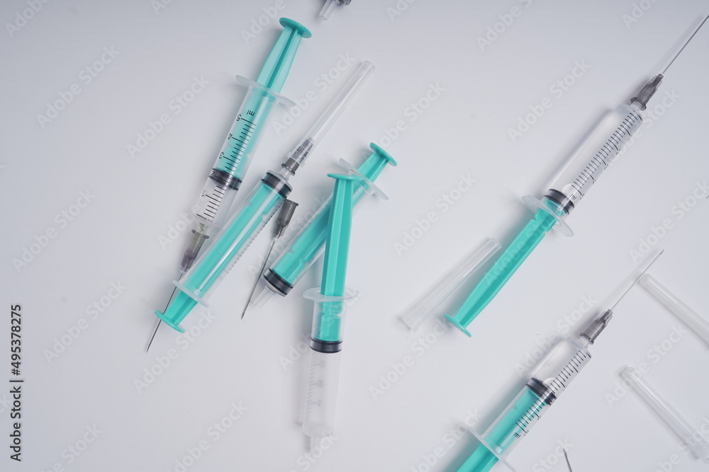medical disposable injection syringe on a white background medical disposable injection syringe on a white background
