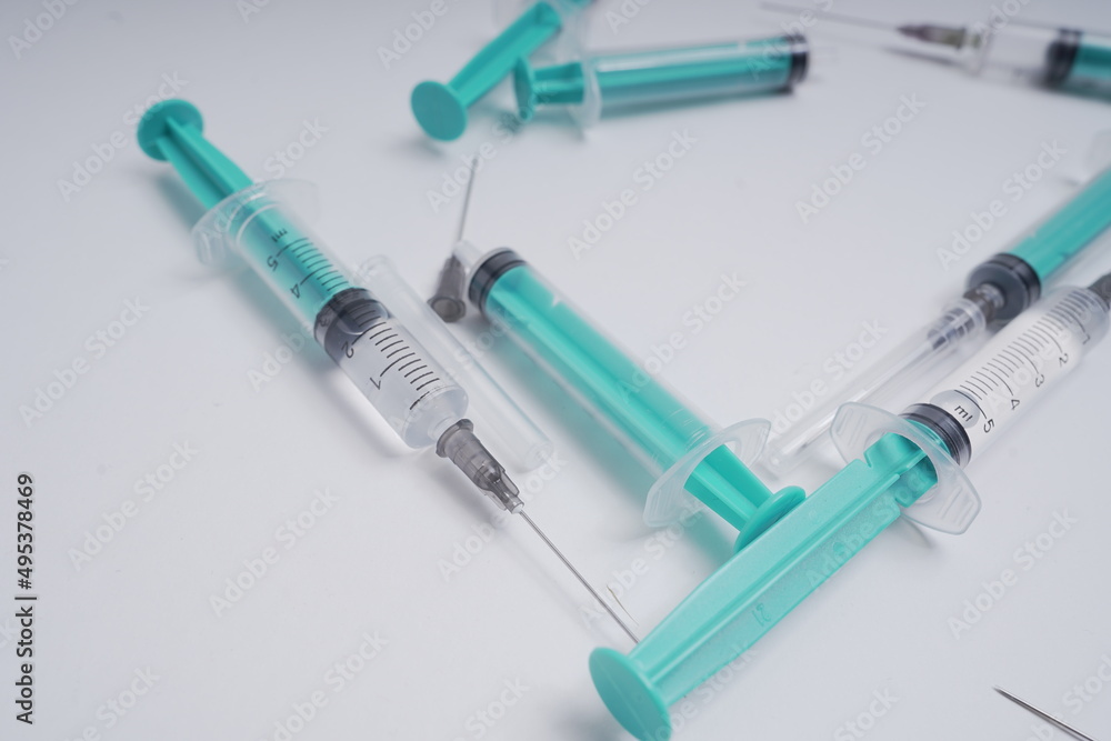 medical disposable injection syringe on a white background medical disposable injection syringe on a white background