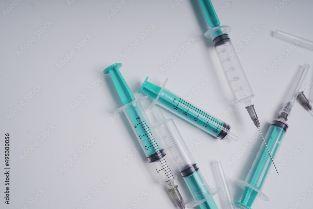medical disposable injection syringe on a white background medical disposable injection syringe on a white background