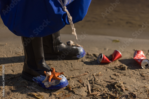 Fototapeta Naklejka Na Ścianę i Meble -  ecological disaster children clean nature saving sea animals 