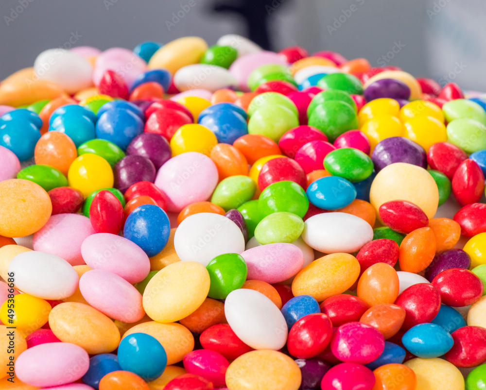 Candies on the colorful background Candies on the colorful background