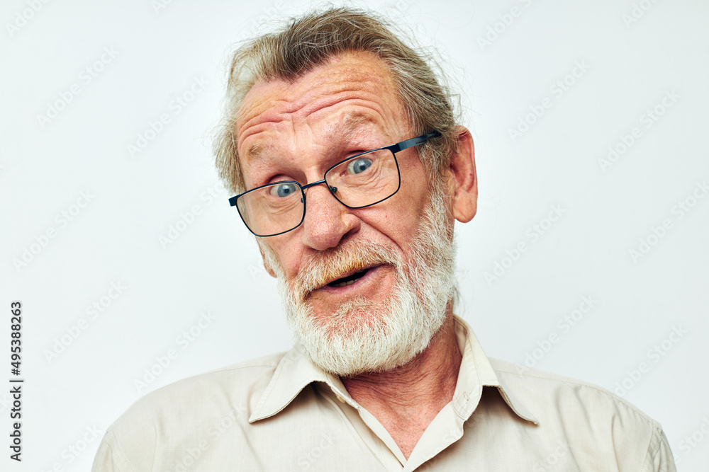 Portrait of happy senior man wears glasses in shirts light background Portrait of happy senior man wears glasses in shirts light background