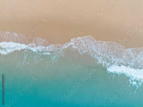Aerial  top view of  the summer beach  blue wave in the tropical sea in summer background