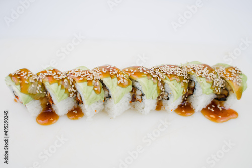 Japanese cuisine roll with avocado and sesame seeds