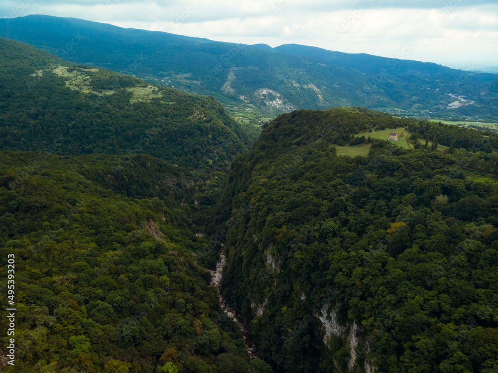Okace canyon aerial view. The mountains are covered with green forest. Natural landscape. Vacation and Travel. Tourist place in Georgia.