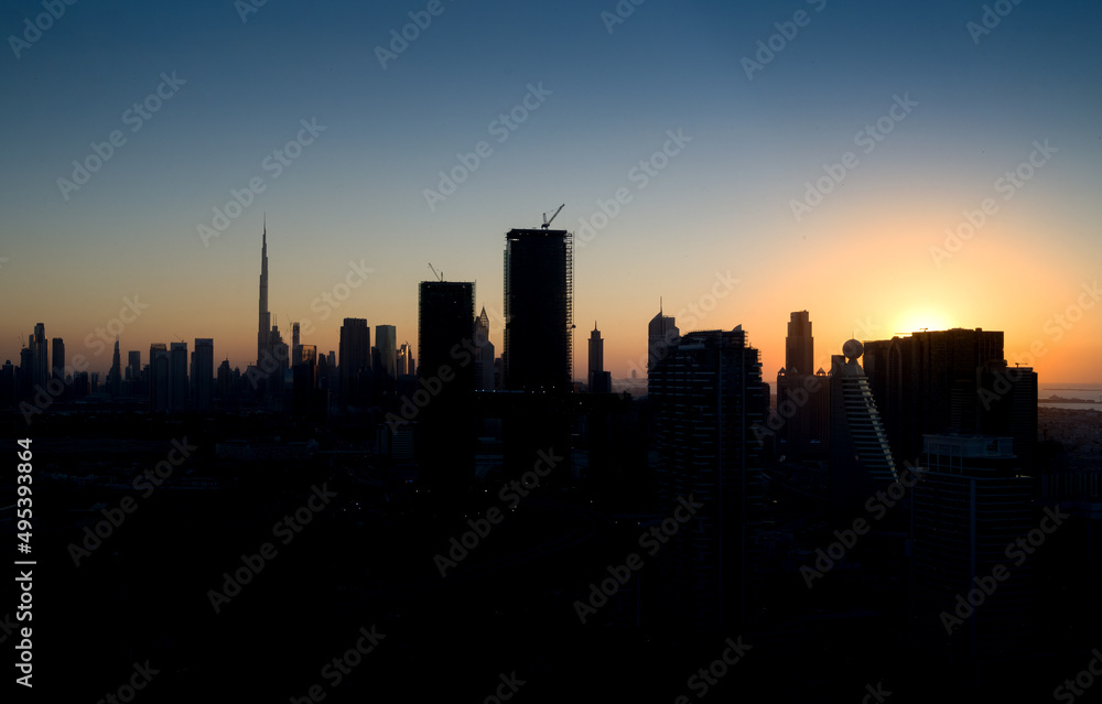 Dubai skyline from top of dubai frame at sunset.