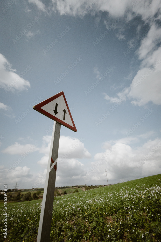 Traffic symbol in countryside landscape Traffic symbol in countryside landscape
