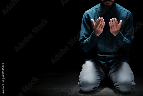 Muslim man praying in the mosque