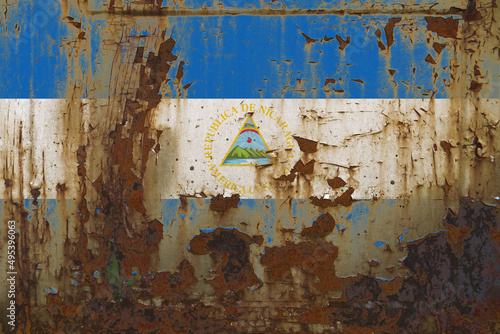 Nicaragua Flag on a Dirty Rusty Grunge Metallic Surface