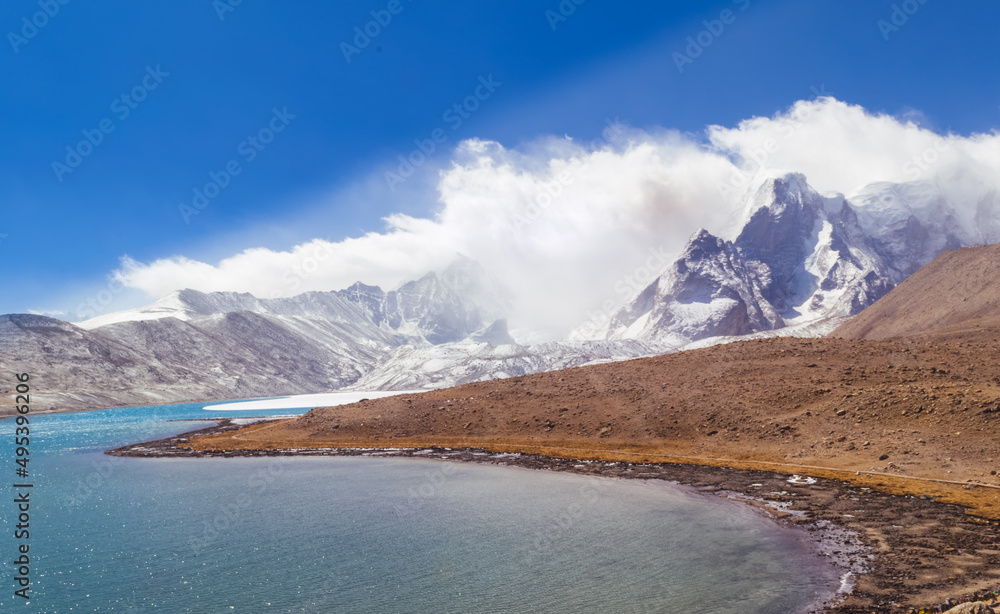 Gurudamba lake at sikkim with snow, clloud and mountain.