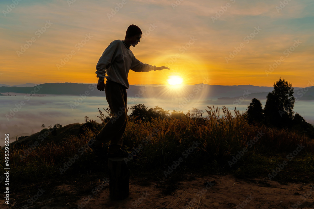 Fototapeta premium man standing on mountains 