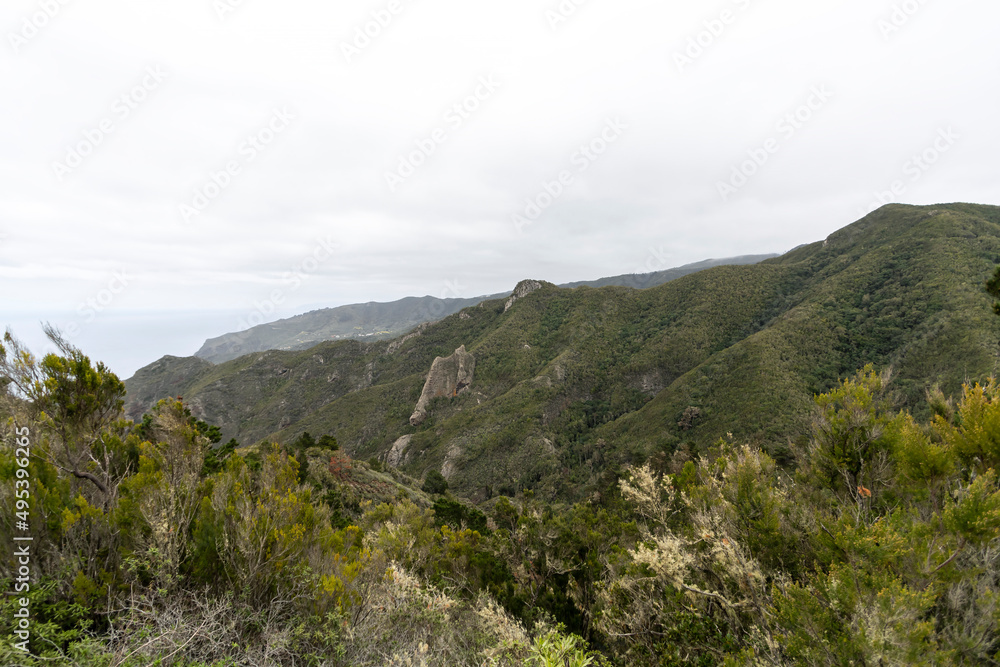Teno volcanic mountain landscape, view of Teno Rural Park in the Tenerife island, Canary Islands, Spain under a cloudy sky Teno volcanic mountain landscape, view of Teno Rural Park in the Tenerife island, Canary Islands, Spain under a cloudy sky