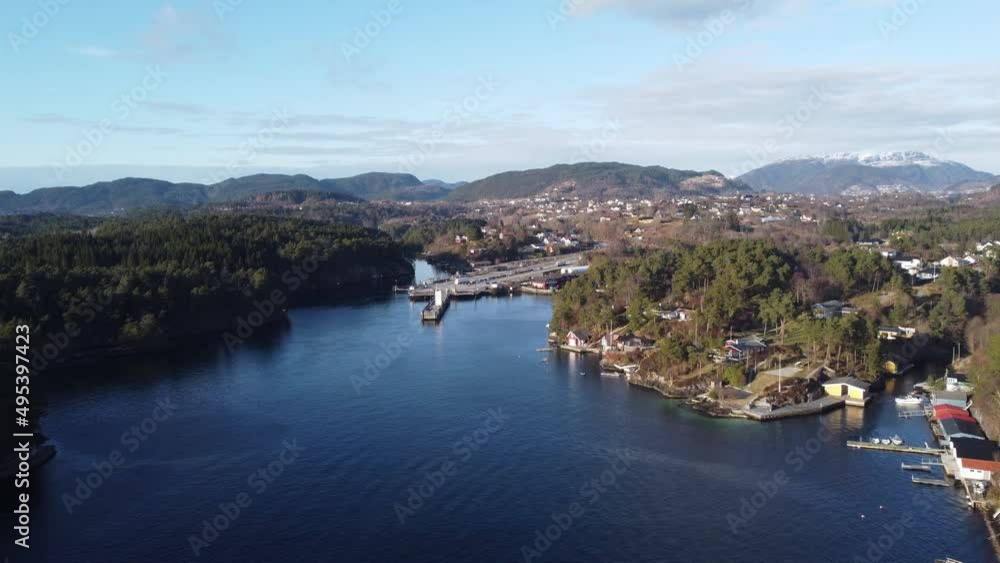 Bay of Halhjem with E39 ferry pier - Sunny day beautiful aerial approach Bay of Halhjem with E39 ferry pier - Sunny day beautiful aerial approach