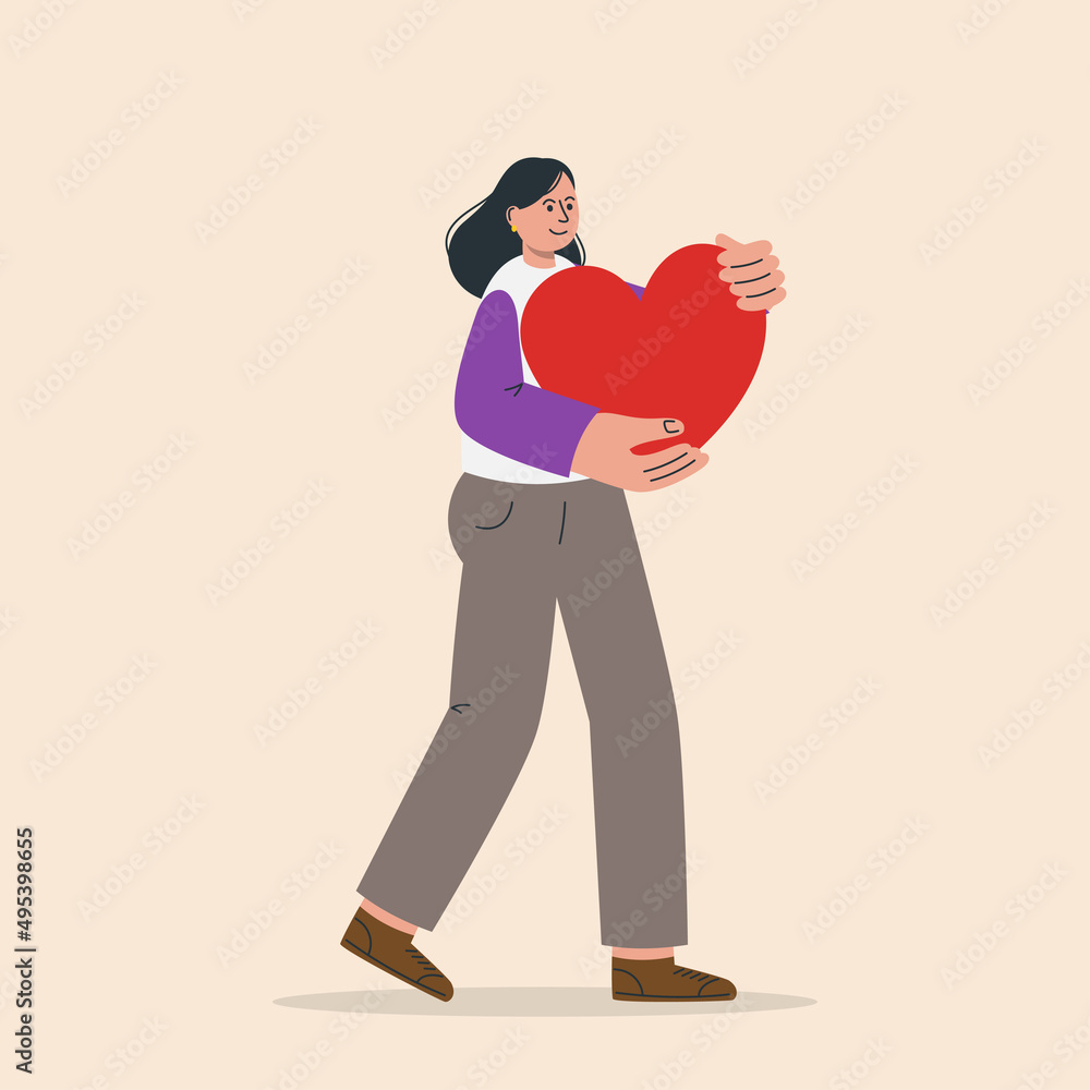 Woman holding big red heart in hand as symbol of love. Concept of charity, hope, solidarity and compassion. Woman holding big red heart in hand as symbol of love. Concept of charity, hope, solidarity and compassion.