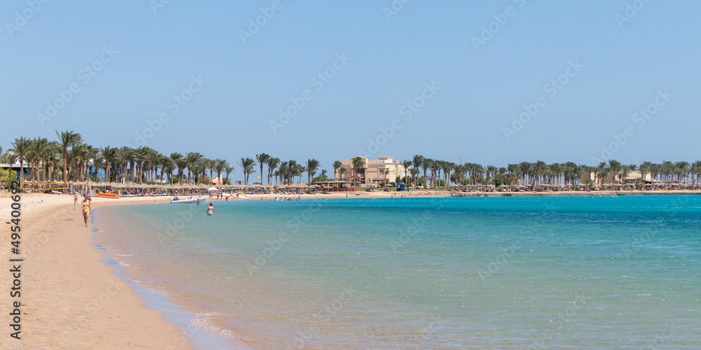 Hurghada, Egypt - September 25 2021: A nice sunny day on the beach at the Red Sea in Hurghada, Egypt