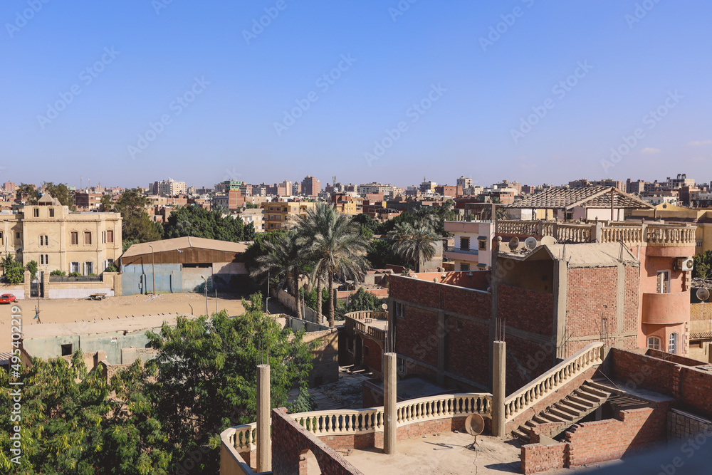 Panoramic View to the Blue Sky and Roofs of the Houses and Buildings of the Local Egyptian People in Giza, Egypt
