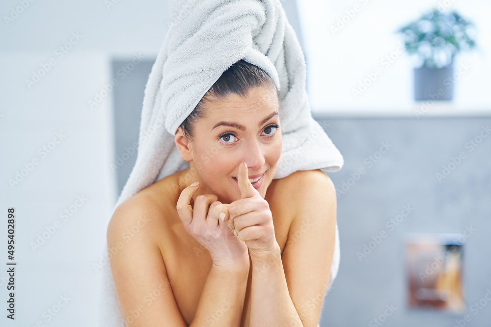 Young nice brunette woman in the bathroom Young nice brunette woman in the bathroom