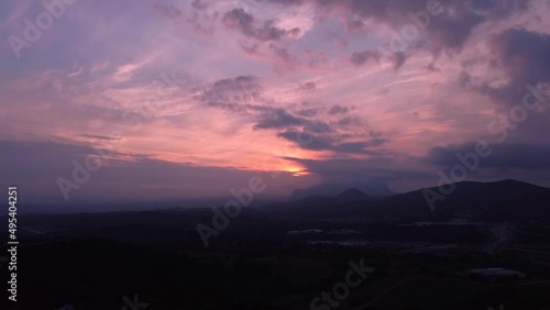 Wallpaper Mural Aerial Dolly Over Silhouetted Landscape In Catalunya With Orange Purple Sunset Storm Cloud  Torontodigital.ca