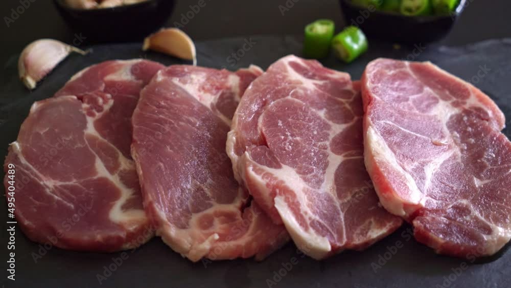 fresh pork neck raw or collar pork on board with ingredients for marinated fresh pork neck raw or collar pork on board with ingredients for marinated