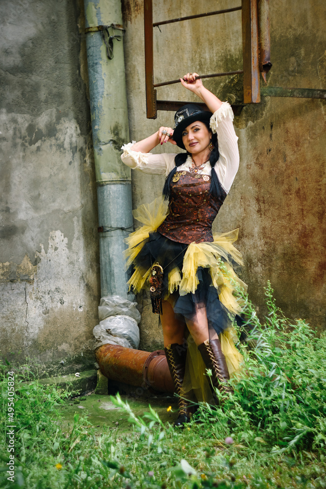 retro portrait of a beautiful woman in a hat. steampunk style.