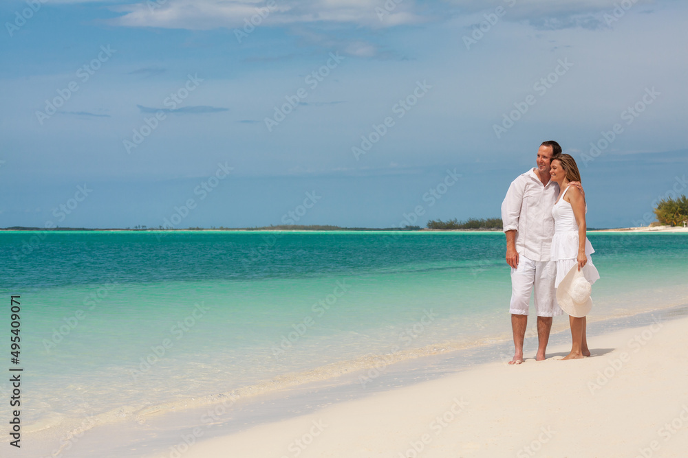 Healthy Caucasian couple loving romance on beach outdoors Healthy Caucasian couple loving romance on beach outdoors