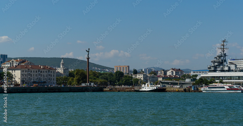 View of Novorossiysk Embankment of Admiral Serebryakov from side of Western mole. Novorossiysk, Russia - September 15, 2021