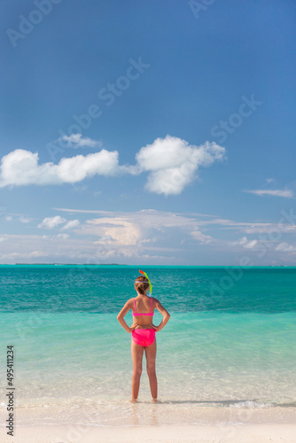 Barefoot young Caucasian female with snorkel equipment Caribbean © Spotmatik