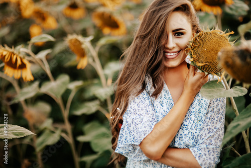  beautiful girl in a sunflower field