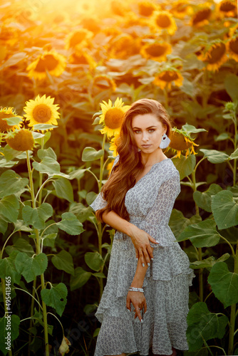 
beautiful girl in a sunflower field