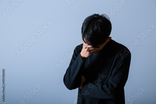 Tableau sur toile 落ち込む若い男性