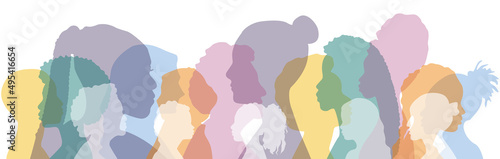 Women stand side by side together.	