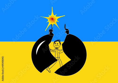 Persona destrozando una bomba en la guerra de Ucrania. Explosivo con mecha destrozado por una persona y sobre la bandera de Ucrania
