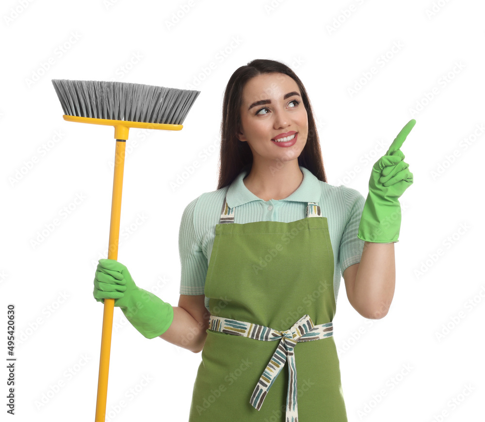Beautiful young woman with broom on white background Beautiful young woman with broom on white background