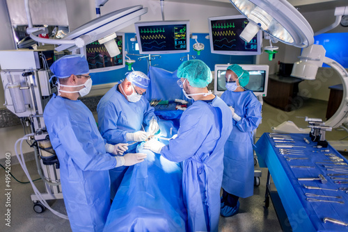 Surgical team in hospital operating theatre performing Laparoscopy