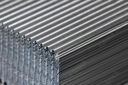 shiny waves of metal. bent aluminum foil. macro photo of corrugation