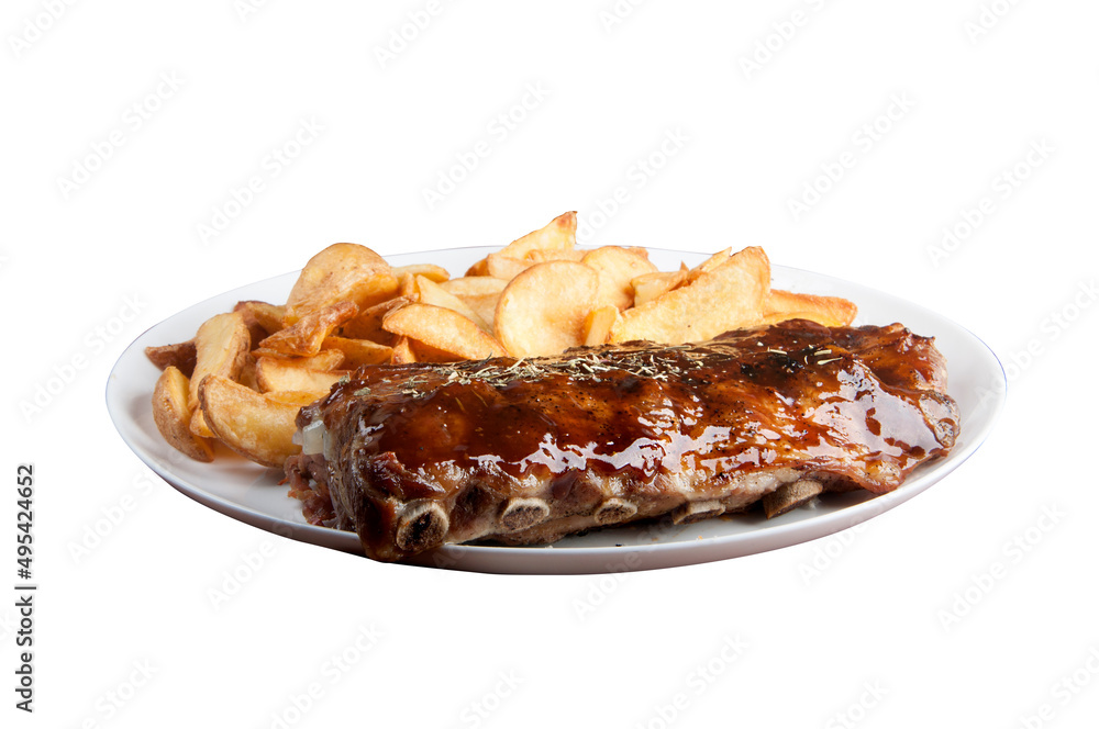 pork ribs with barbecue sauce and rustic potatoes isolated on white background pork ribs with barbecue sauce and rustic potatoes isolated on white background