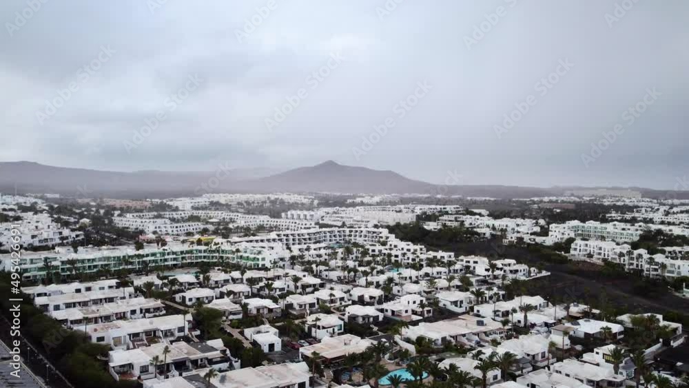 Aerial view of exotic island with mountains and holiday resorts. Popular travel and tourism hotspot Aerial view of exotic island with mountains and holiday resorts. Popular travel and tourism hotspot