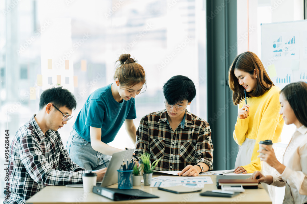 Asian Business People Analyzing Statistics Financial Concept. Asian Business People Analyzing Statistics Financial Concept.