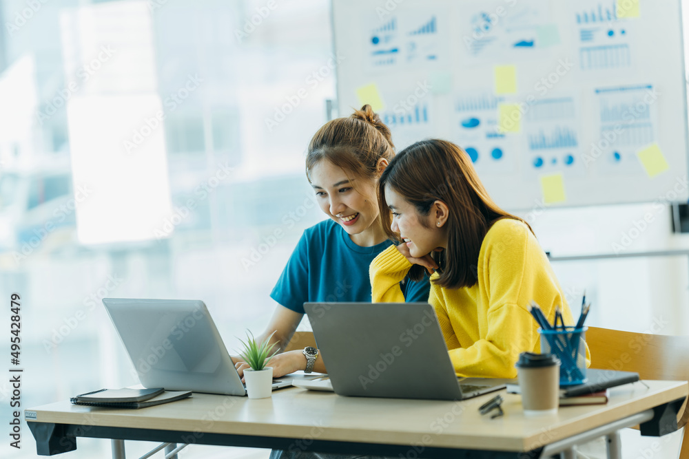 Asian Business People Analyzing Statistics Financial Concept. Asian Business People Analyzing Statistics Financial Concept.