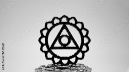 Symbol pendant on white background.