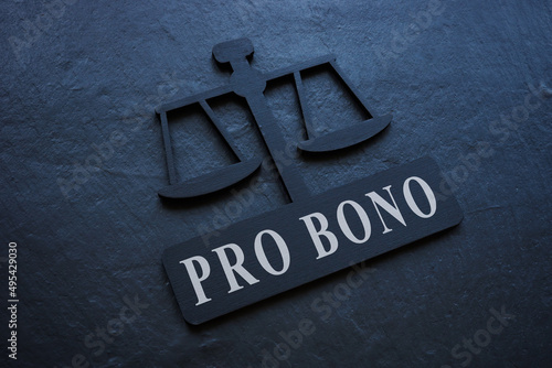 The inscription Pro bono on the plate in the form of scales.
