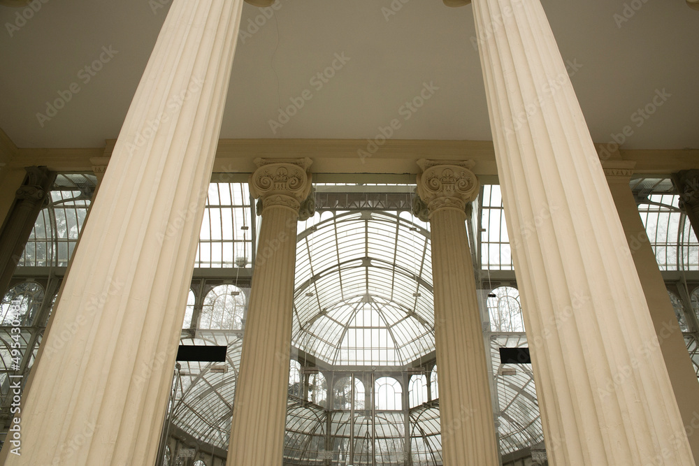 Obraz premium Close up of the ceiling and columns of Crystal Palace in Retiro Park, Madrid, Spain.